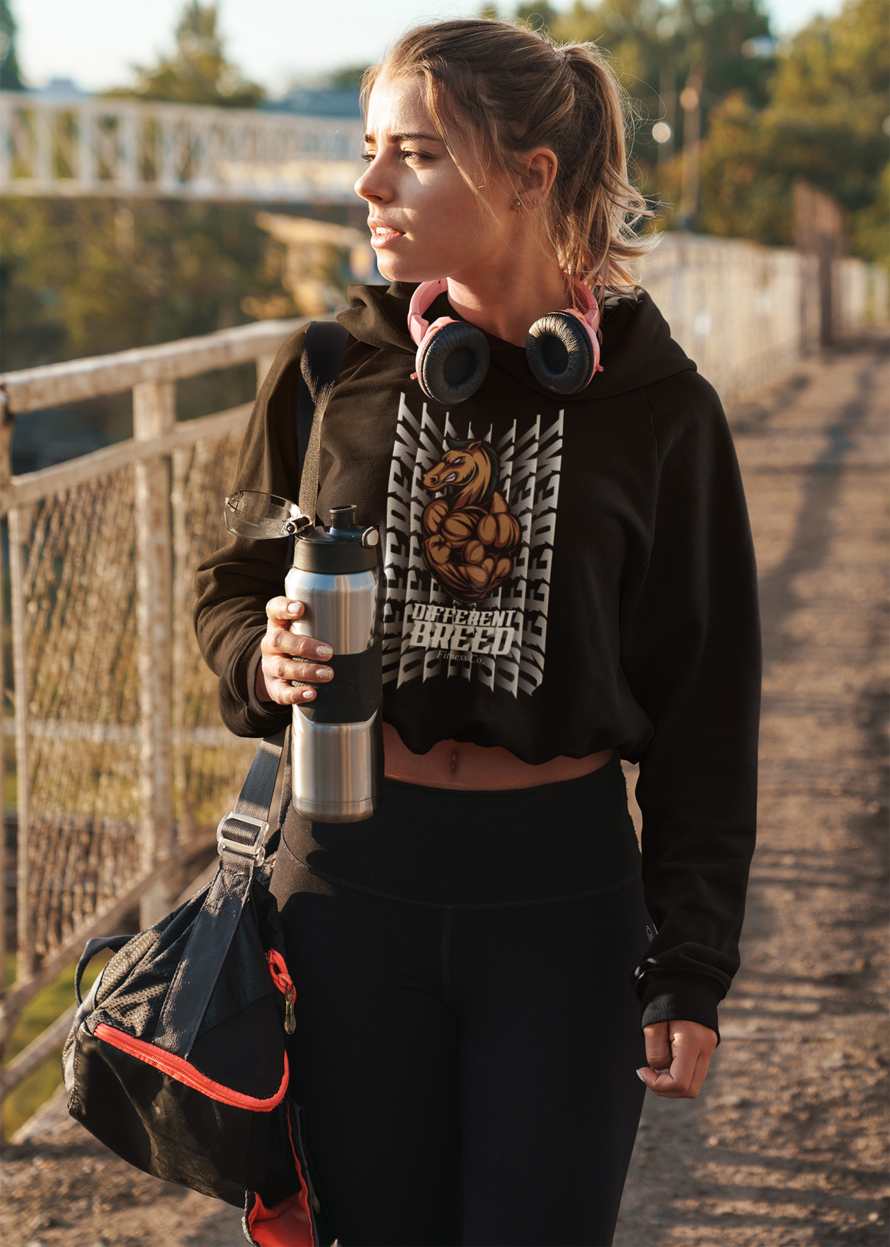 mockup-of-a-woman-wearing-a-crop-top-hoodie-while-walking-to-the-gym-46218-r-el2