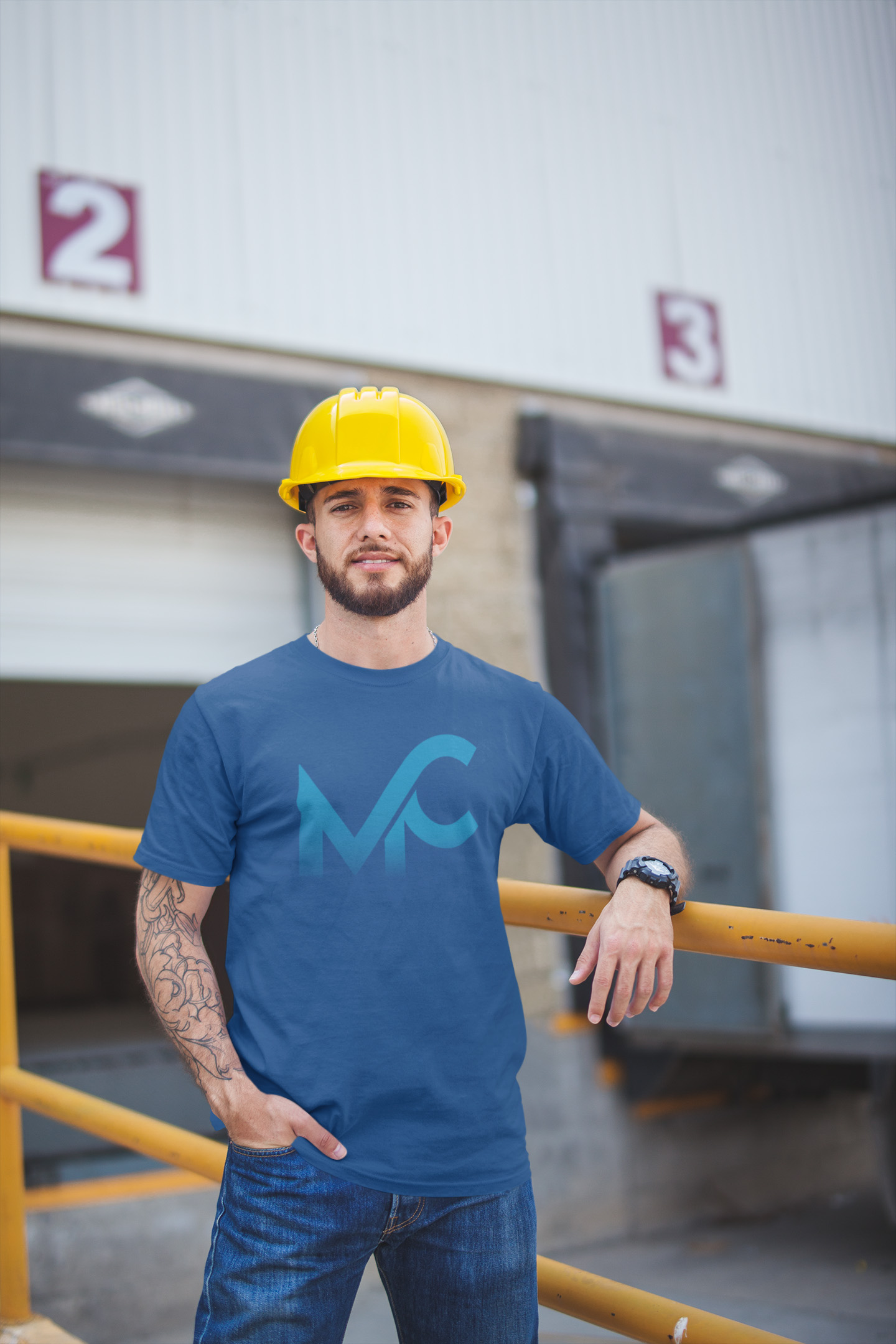 mockup-of-a-tattooed-man-wearing-a-t-shirt-outside-the-warehouse-a20446