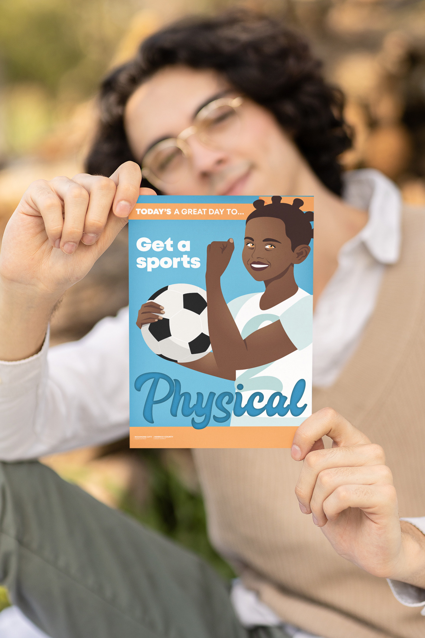 mockup-of-a-smiling-man-showing-a-vertical-flyer-m18478